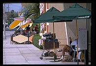 Homeless guy relaxing at Starbucks. Toluca Lake, California.