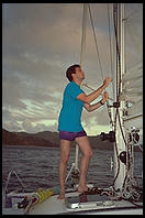 Harry does something with the main sail of the Diane