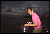Harry Greenspun cooks.  Stern of the Diane.  Caribbean.