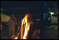 Staying warm around the fire, outside the Fulton Fish Market.  Manhattan 1994 (pre burning).