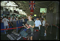 Eve standing in British Airways in Boston airport, heading for Stockholm