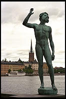 Statue near Stadshuset in Stockholm.  Gamla Stan (Old Town) is in the background.