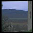 A distance view of the ruined abbey of San Galgano, between Rome and Florence