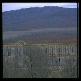 A distance view of the ruined abbey of San Galgano, between Rome and Florence