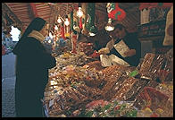 A nun shopping in Padua's Piazza Delle Erbe