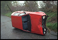 Overturned Golf.  Entering the Wicklow Mountains south of Dublin, Ireland.