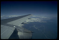 Flying Alaska Range to King Salmon over the snowfield-covered mountains that form the Alaska Peninsula.