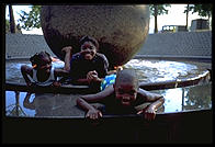 Kids in a fountain.  Downtown Philadelphia.