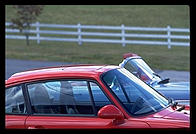Porsche 911 and old Corvette.