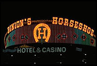 Sign for Binion's Horseshoe.  Downtown Las Vegas.  The owner of Binion's, Ted Binion, was murdered on September 17, 1998 by Sandy Murphy, Binion's 27-year-old girlfriend and former topless dancer, and her lover, Rick Tabish