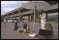 Musician on the waterfront.  Seattle, Washington