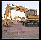 Backhoes.  Caterpillar Arizona Proving Grounds