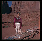 Navajo girl selling jewelry.  Monument Valley.