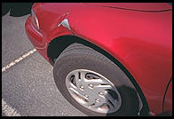 Dented rental car in Berkeley, California.  They did not leave a note.